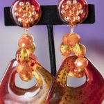 orange long dangling clip on earring