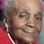 Mother wearing Bea Silver and gold clip on earring