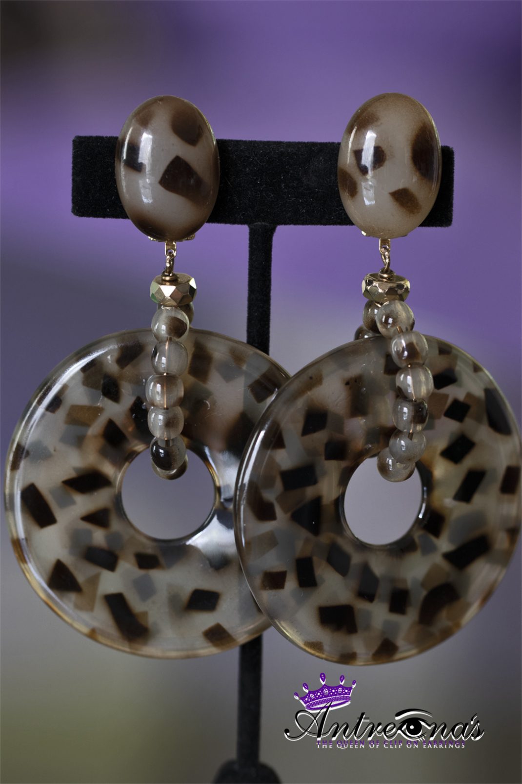 Leopard print hoop clop on earring.