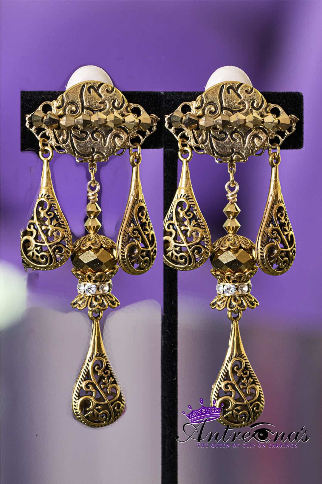 Gold dangling clip on earring