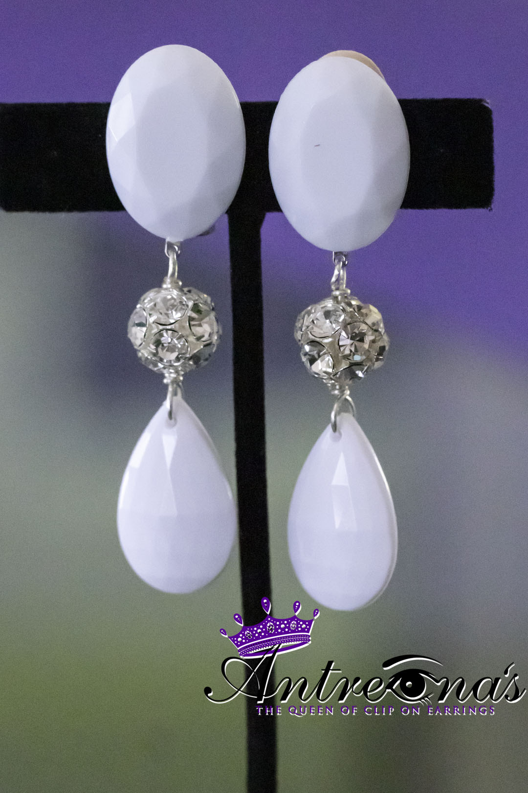 Un-pierced white lightweight earrings.