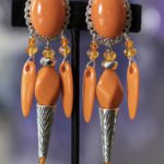 Orange clip on earrings
