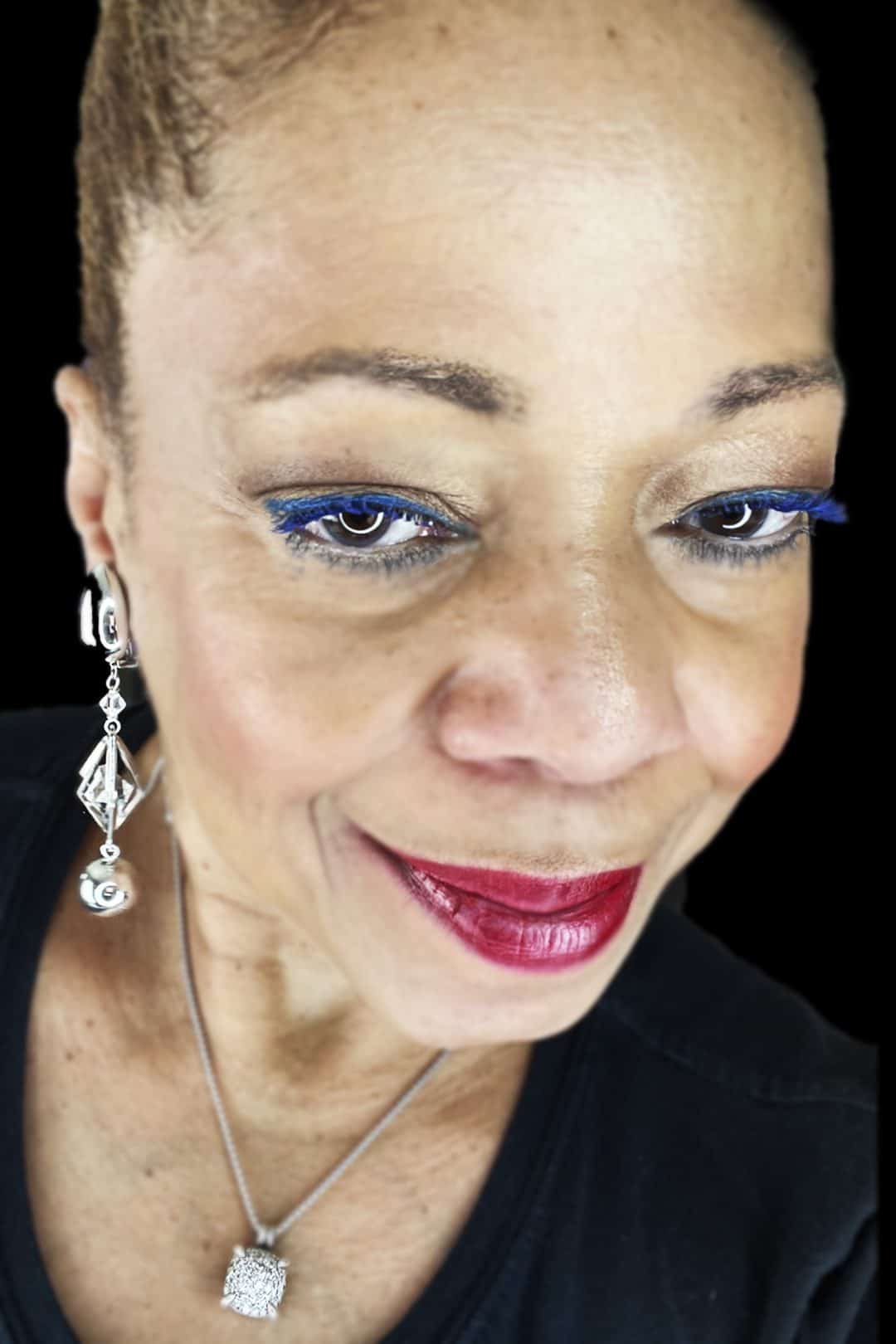 Woman wearing silver handmade comfortable clip earrings.