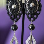 Image black silver clip on earrings