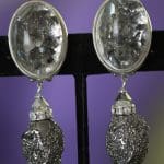 Comfortable clip earrings with a decorative transparent cab