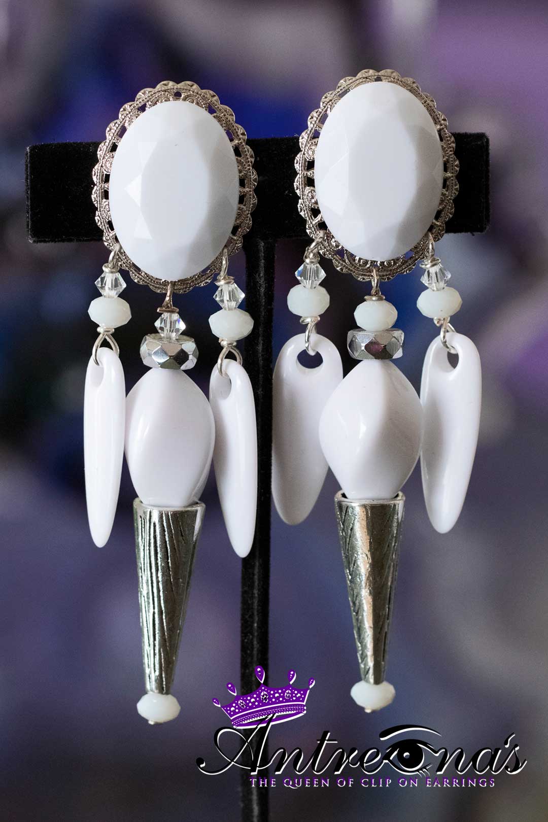 Comfortable no pain exotic white clip earrings.