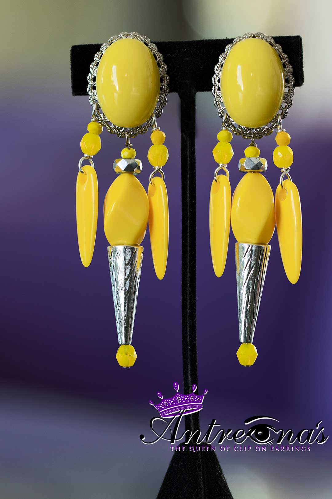 Comfortable no pain exotic yellow clip earrings.