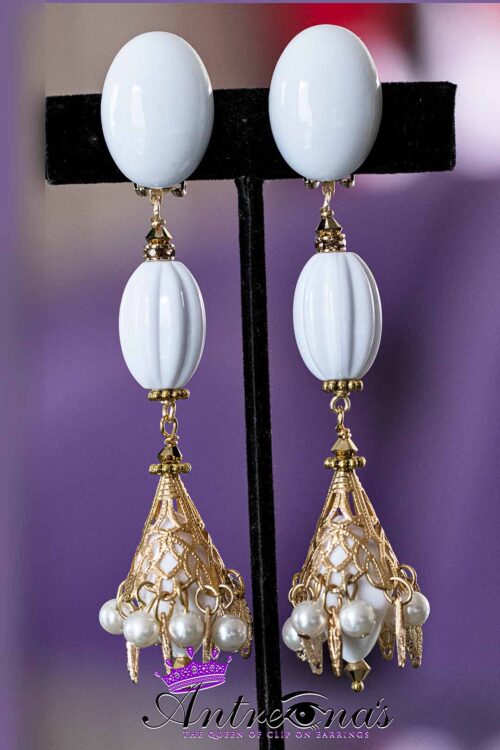 White long dangle clip on earrings.