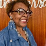 Margo wearing denim earrings