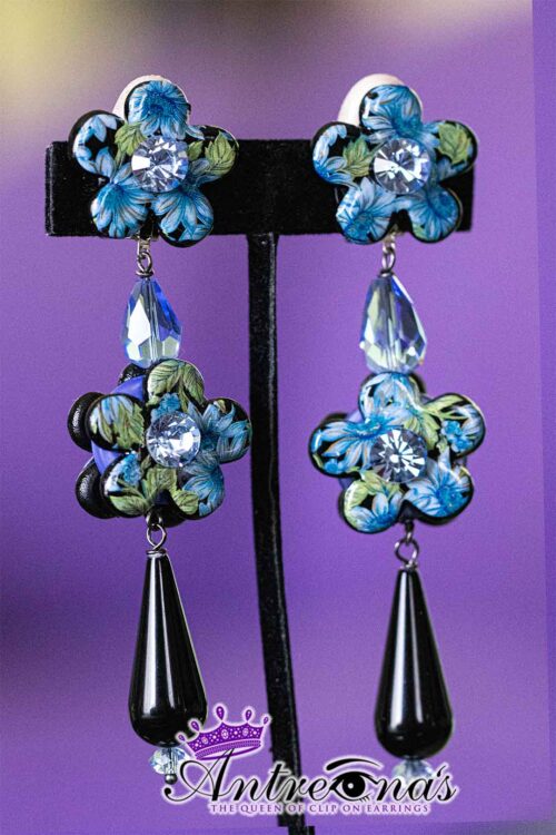Blossom Blue five petal comfortable clip on earrings.