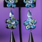 Blossom Blue five petal comfortable clip on earrings.