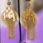 Cowgirl fringe westen clip on earrings.