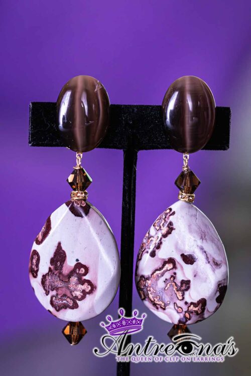 Marbled Earth Grace features a pair of elegant clip-on earrings with tiger eye cab.