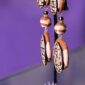 Earthbound Elegance is a pair of brown comfortable clip-on earrings.