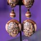 Earthbound Elegance is a pair of brown comfortable clip-on earrings.